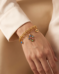 Soft Brilliance Bracelet, gold-tone, worn on the wrist | Soft Brilliance armband, goudkleurig, gedragen om de pols