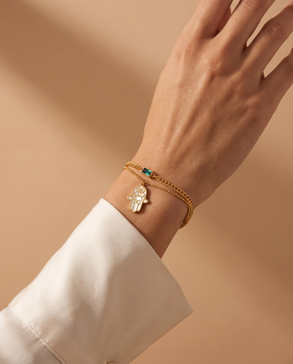 Blush Radiance Bracelet, gold-tone, worn on the wrist | Blush Radiance armband, goudkleurig, gedragen om de pols