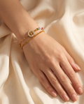Morning Bliss Bracelet worn on the wrist: Tree of Life disc with coloured beads and curb chain | Morning Bliss armband om de pols: levensboom-bedel met gekleurde kraaltjes en schakelketting